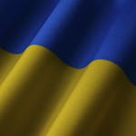 Close-up of the Ukrainian flag showing vibrant blue and yellow waves.